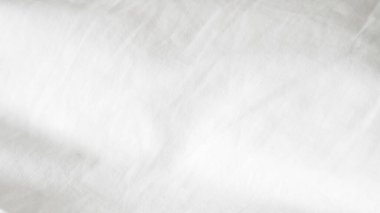 Pürüzsüz beyaz yatak örtüsü, yumuşak doku, temiz ve minimalist stil