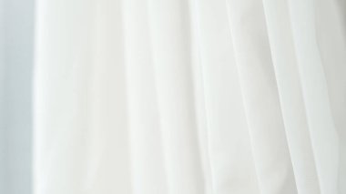 Yumuşak beyaz kumaş arka plan tasarım ve dokular için mükemmel, pürüzsüz ve zarif.