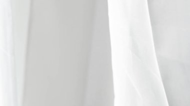 Yumuşak beyaz kumaş arka plan tasarım ve dokular için mükemmel, pürüzsüz ve zarif.