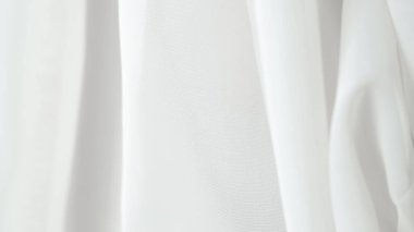 Yumuşak beyaz kumaş arka plan tasarım ve dokular için mükemmel, pürüzsüz ve zarif.