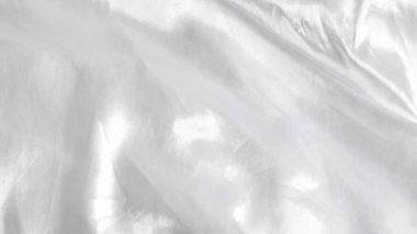 Pürüzsüz beyaz ipek çarşaflar, yumuşak ve lüks kumaş, zarif battaniye arkaplan