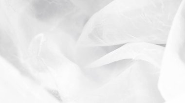 Şeffaf katmanlar ve yumuşak ışık içeren ruhani beyaz tül örtüsü arkaplanı..