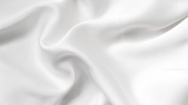 Yumuşak ve narin beyaz kumaşlı, yumuşak kumaşlı.