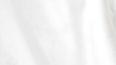 Yumuşak ve pürüzsüz bir dokusu olan basit ve temiz bir beyaz kumaş.