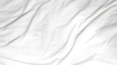 Yumuşak kıvrımlı beyaz yatak ve dizayn veya metin yerleştirme için boş alan