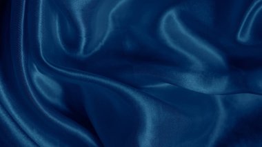 Yumuşak mavi tonlarda, dalgalı ve narin parıltılı rüya gibi ipek dokular.