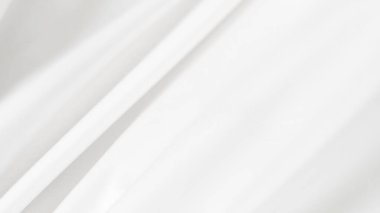 Yumuşak markalaşma ve asgari fotoğraf biçimlerinde kullanılan kremsi beyaz ipek arkaplan.