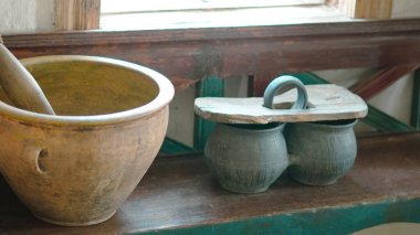 Traditional Ukrainian household items inside Pirogovo open air museum in Kyiv, Ukraine ,15.06.2025.
