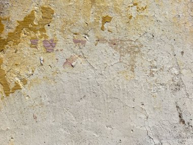 Suratsız, Meksika 'da boyası soyulan alçı bir duvar. Doku Arkaplanı.