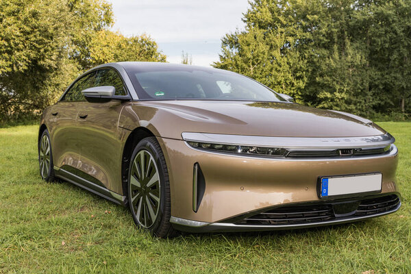 RALSKO ,CZECH REPUBLIC - 19 Sept 2023. LUCID Air. LUCID AIR luxury car on a meadow near the forest. Modern electric car LUCID.