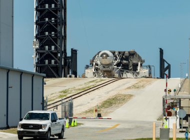 CAPE CANAVERAL, FLORIDA - 15 MARCH 2024. FALCON 9 rocket lying horizontally during repair. A rocket carrying a set of satellites into orbit around the earth, Elon Musk's company SpaceX. CAPE CANAVERAL clipart