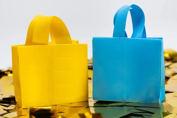 Жовті Сині Мішки Орігамі Паперу Блискітках Концепція Закупівель Продажів — стокове фото