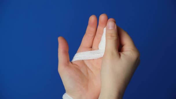 Injury Finger Bandage Arm Blue Background Fracture Fissure Bone Trauma — Stock Video