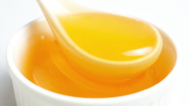 Liquid Bee Honey Spoon Showing Linden Fresh Honey White Background — Vídeo de Stock