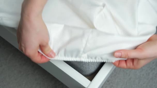 White Satin Sheet Elastic Band Put Mattress Bed Close Hands — Stock Video