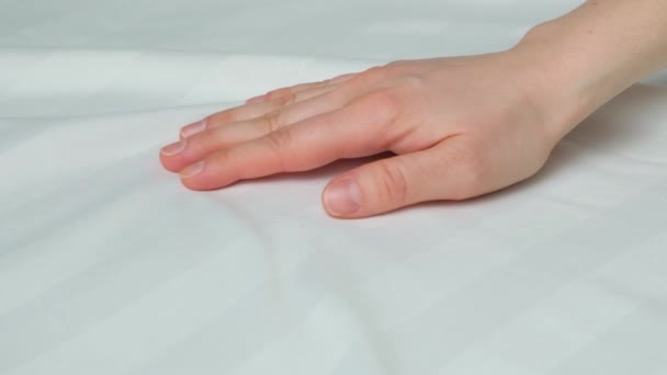 Tenderness Softness Stripe Satin Bed Linen Woman Runs Her Hand — Vídeo de stock
