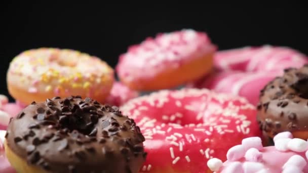 Donuts Red Pink Chocolate Icing Marshmallows Spin View — Stok video