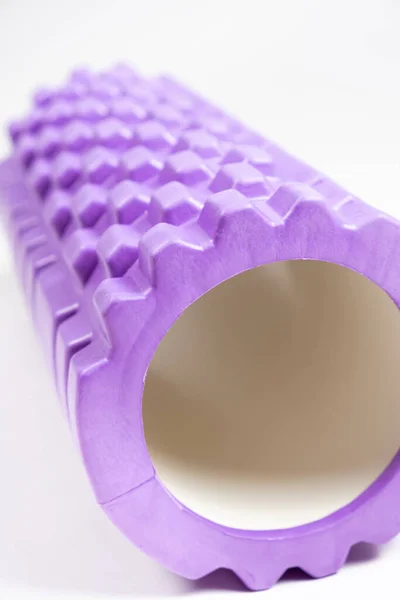 Massage roller, myofascial release. Sports equipment for self-massage of the muscles of the back and body