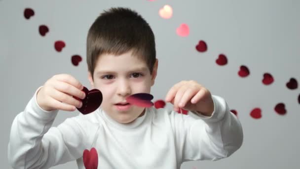 Cute Little Preschool Boy Plays Garland Form Hearts Valentines Day — Stock Video
