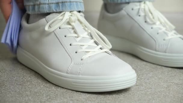 Woman Cleans White Leather Sneakers Rag Removes Dust Takes Step — Stock Video