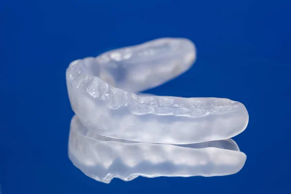 stock image Dental mouthguard, splint for the treatment of dysfunction of the temporomandibular joints, bruxism, malocclusion, to relax the muscles of the jaw