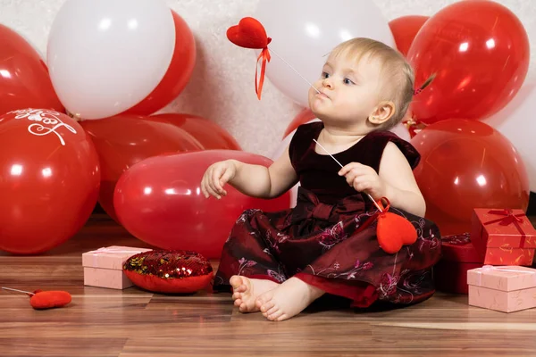 Cute Little Girl Blonde Plays Hearts Sticks Valentines Day — Stock fotografie