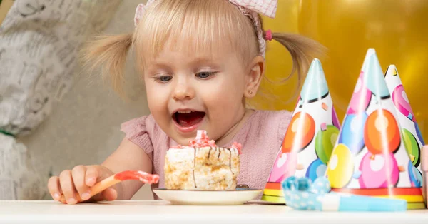 Two Year Old Blonde Girl Eating Birthday Cake Her Birthday Royalty Free Stock Photos
