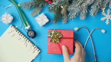 Sağlıklı Noel - tıbbi ve sağlık çalışanları için hediye, üst görünüm, yakın çekim.