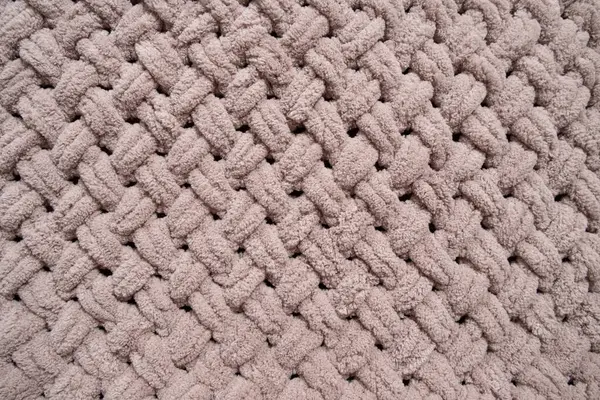 Patterns of soft plush knitted blanket handmade, color dusty rose.