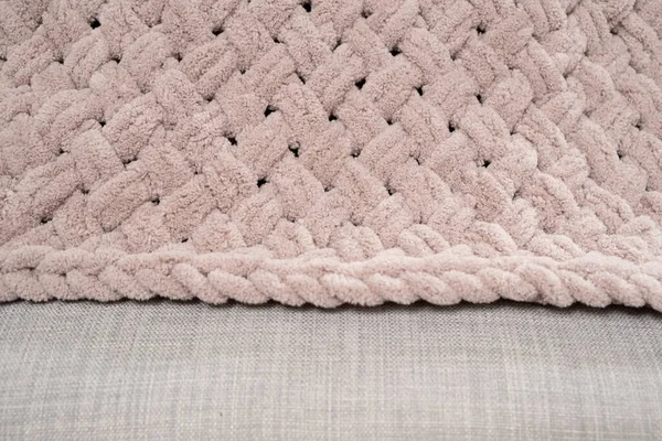 Patterns of soft plush knitted blanket handmade, color dusty rose.