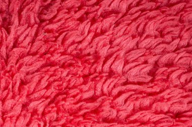 Pembe mikrofiber kumaş, yakın çekim makro. Ev kıyafetleri yapmak için yumuşak kumaş