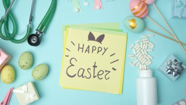 Medische Lay Out Met Stethoscoop Ansichtkaart Met Happy Easter Tekst — Stockvideo