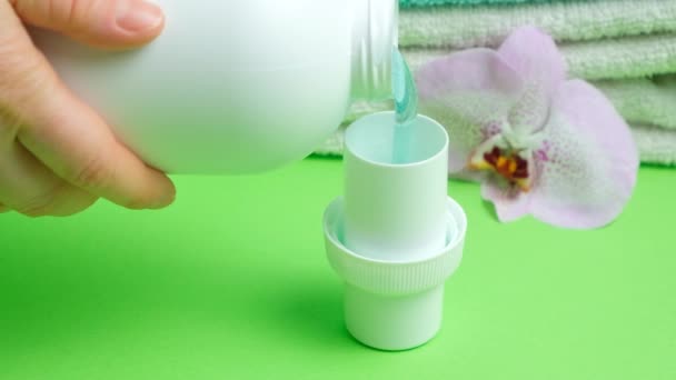 Process Pouring Natural Eco Gel Liquid Laundry Detergent Bottle Cap — Stock Video