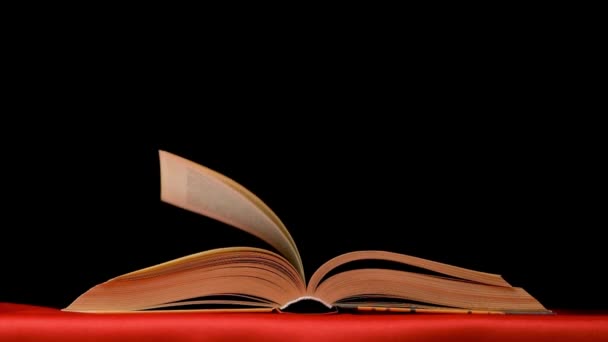 Pages Book Turn Themselves Red Black Background Slow Motion — Stock Video