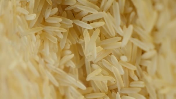 Dlouhozrnná Předpařená Rýže Basmati Rotující Vertikální Střelba — Stock video