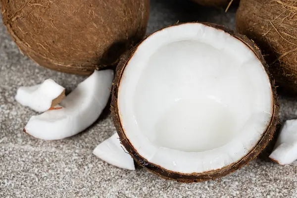 Coconut milk in half a coconut.