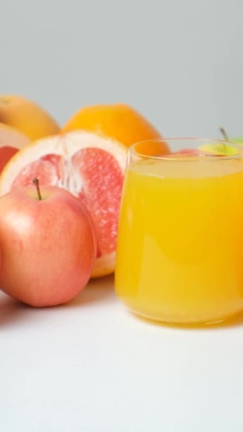 Multifruit Juice Glass Fresh Fruits White Background — Stock Video