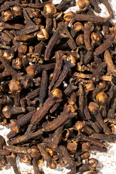 Stock image Dried clove spice, macro top view.