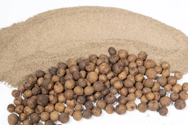 stock image Ground black pepper and peppercorns close-up