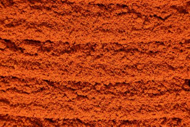 Zemin kırmızı biber, kırmızı terracotta baharat arka plan, aşçılık sanatı.