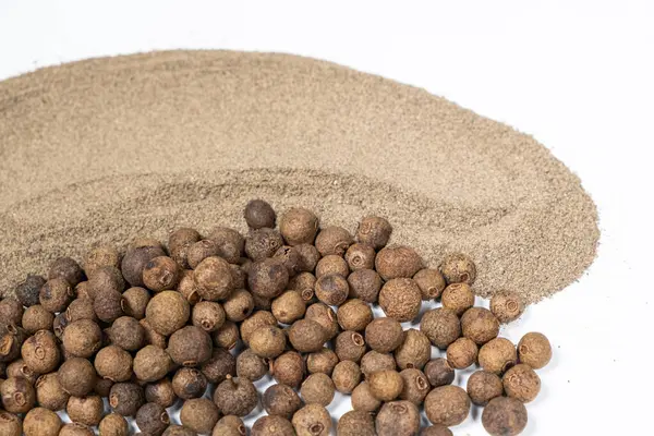 stock image Ground black pepper and peppercorns close-up