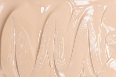 Vakfın soyut bej arka planı, kozmetolojide sanat.