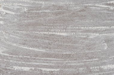 Arkaplanda dökülen buğday ununun gri pişirme arka planı, üst görünüm