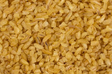 Yukarıdan dağınık bulgur görünümü arkaplanı.