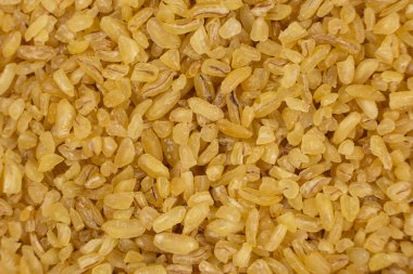 Yukarıdan dağınık bulgur görünümü arkaplanı.