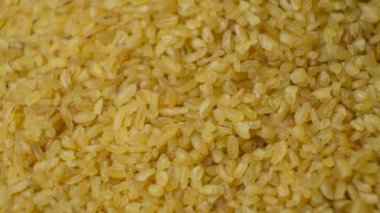 Pişmemiş bulgur Groats makroyu döndürür