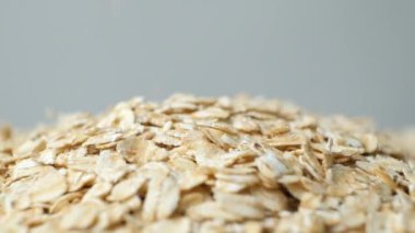 Pişmemiş çiğ yulaf ezmesi Makro ağır çekim dök