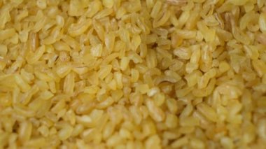 Pişmemiş bulgur Groats makroyu döndürür