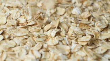 Pişmemiş çiğ yulaf ezmesi Makro ağır çekim dök.