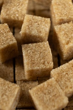 Rafine edilmemiş kahverengi baston makro küp demerara şekeri